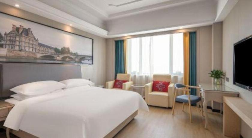 Vienna International Hotel Shanghai Pujiang Экстерьер фото